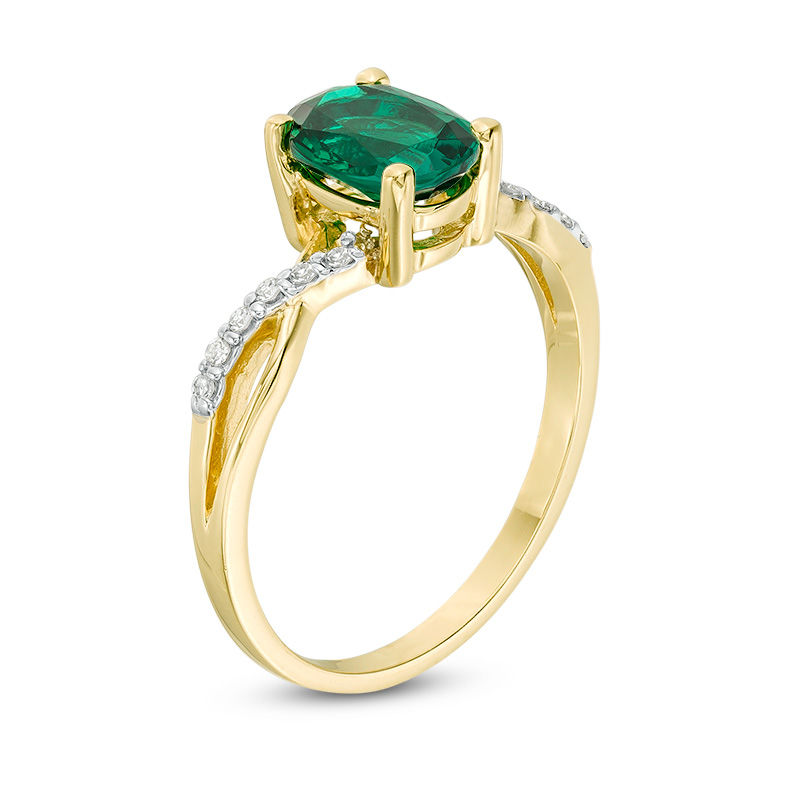 Main Image 3 of Oval Lab-Created Emerald and 1/20 CT. T.W. Diamond Twist Shank Ring in 10K Gold