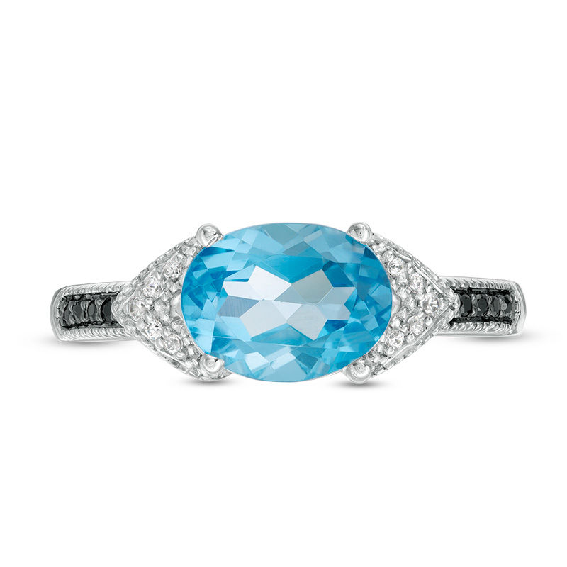 Sideways Oval Blue Topaz and 1/15 CT. T.W. Enhanced Black and White Diamond Vintage-Style Ring in Sterling Silver