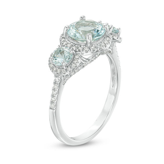 Aquamarine and 1/3 CT. T.w. Diamond Frame Three Stone Engagement Ring in 14K White Gold