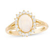 Thumbnail Image 0 of Oval Opal and 1/3 CT. T.W. Diamond Sunburst Frame Ring in 14K Gold