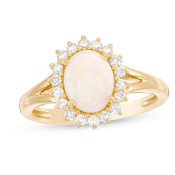 Oval Opal and 1/3 CT. T.w. Diamond Sunburst Frame Ring in 14K Gold