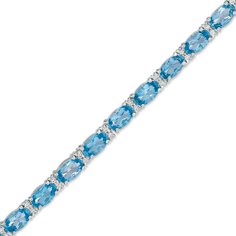 Main Image 1 of Oval Blue Topaz and Lab-Created White Sapphire Line Bracelet in Sterling Silver