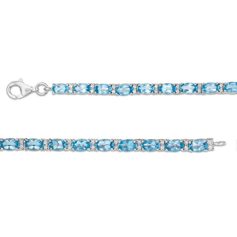 Oval Blue Topaz and Lab-Created White Sapphire Line Bracelet in Sterling Silver