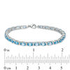 Thumbnail Image 3 of Oval Blue Topaz and Lab-Created White Sapphire Line Bracelet in Sterling Silver