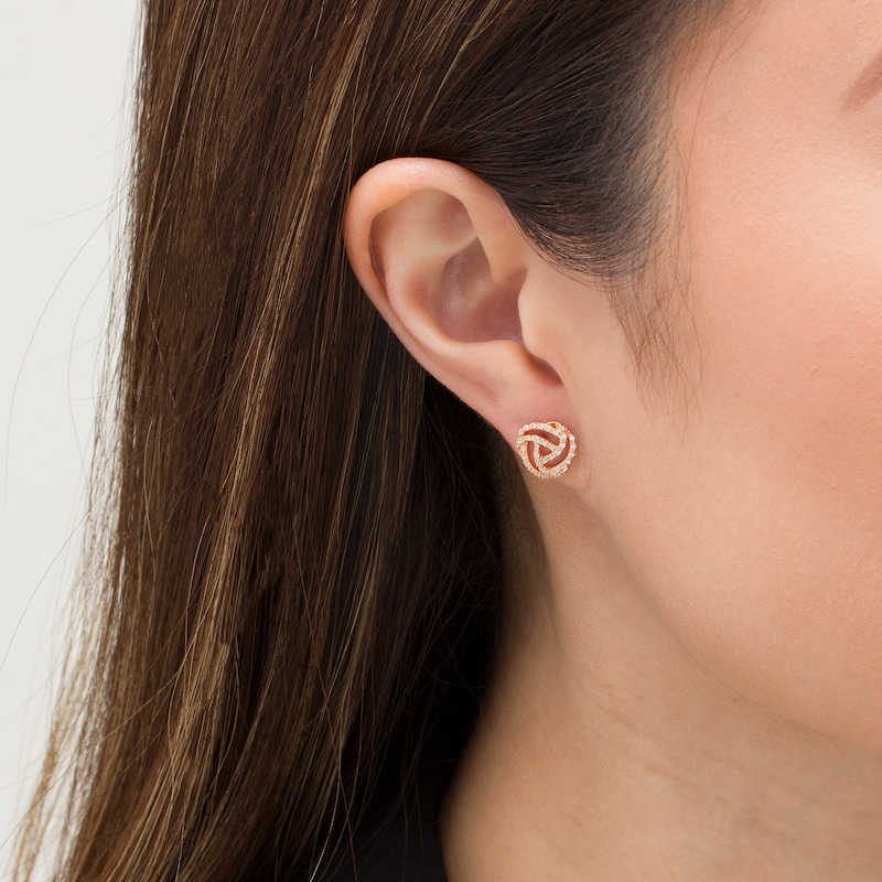 Main Image 2 of 1/5 CT. T.W. Diamond Open Love Knot Stud Earrings in 10K Rose Gold