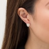 Thumbnail Image 2 of 1/8 CT. T.W. Diamond Heart-Shaped Love Knot Stud Earrings in 10K Gold