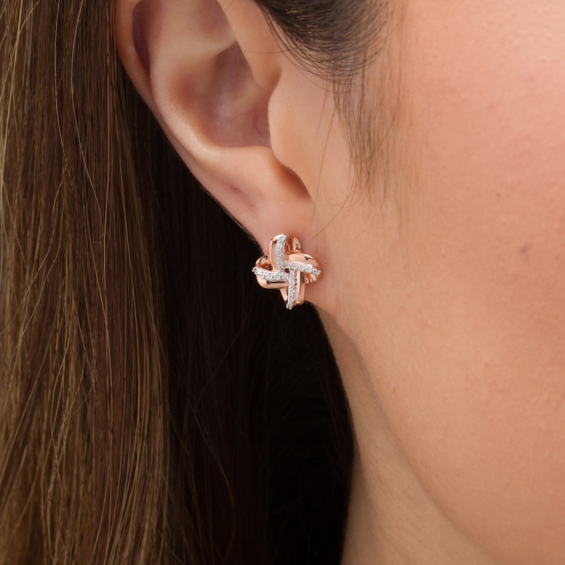 Main Image 2 of 1/10 CT. T.W. Diamond Love Knot Stud Earrings in 10K Rose Gold