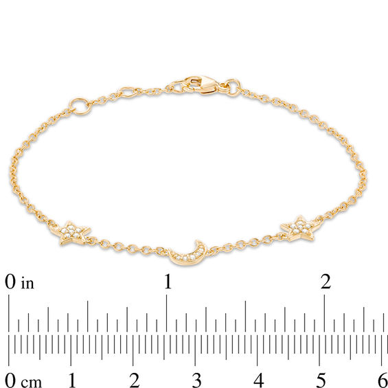 1/10 CT. T.w. Diamond Star and Crescent Moon Bracelet in 10K Gold