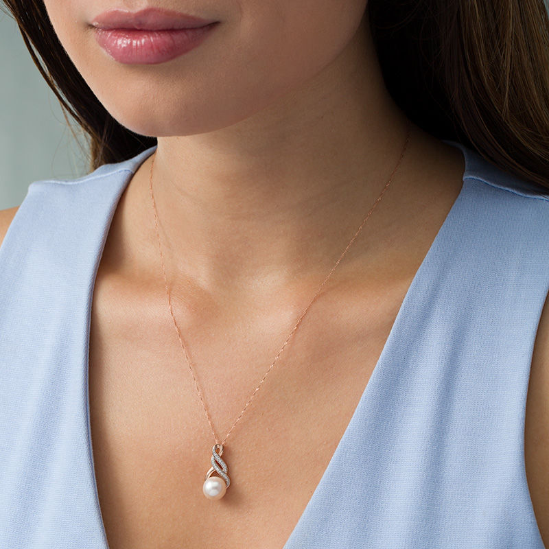 9.0 - 9.5mm Cultured Freshwater Pearl and 1/20 CT. T.W. Diamond Infinity Twist Pendant in 10K Rose Gold