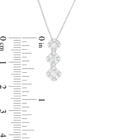 1/2 CT. T.w. Baguette and Round Diamond Frame Graduated Three Stone Pendant in 10K White Gold