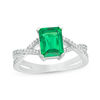 Thumbnail Image 0 of Emerald-Cut Lab-Created Emerald and 1/10 CT. T.W. Diamond Criss-Cross Split Shank Ring in 10K White Gold