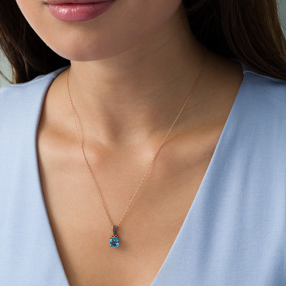 7.0mm Cushion-Cut Blue Topaz and 1/20 CT. T.W. Enhanced Black Diamond Infinity Pendant in 10K Rose Gold 7.0mm Cushion-Cut Blue Topaz and 1/20 CT. T.W. Enhanced Black Diamond Infinity Pendant in 10K Rose Gold