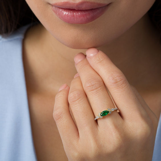 Sideways Marquise Lab-Created Emerald and 1/10 CT. T.w. Diamond Petals Ring in 10K Gold