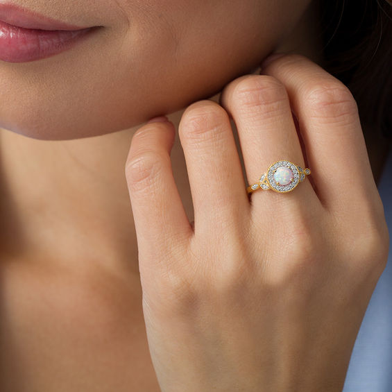 5.5mm Lab-Created Opal and 1/8 CT. T.W. Diamond Frame