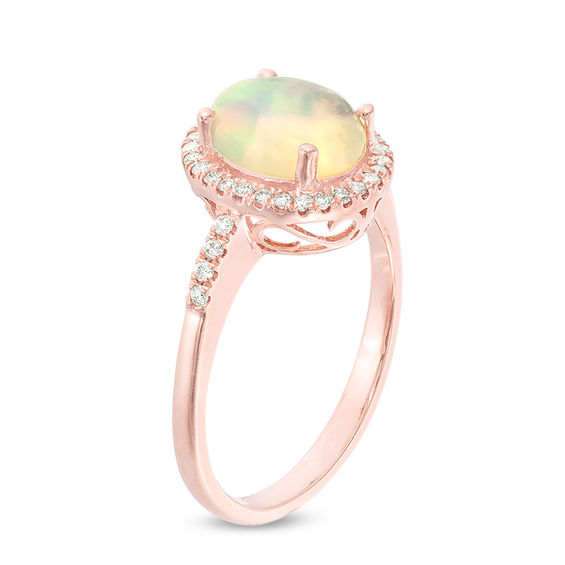 Oval Opal and 1/6 CT. T.w. Diamond Frame Ring in 14K Rose Gold
