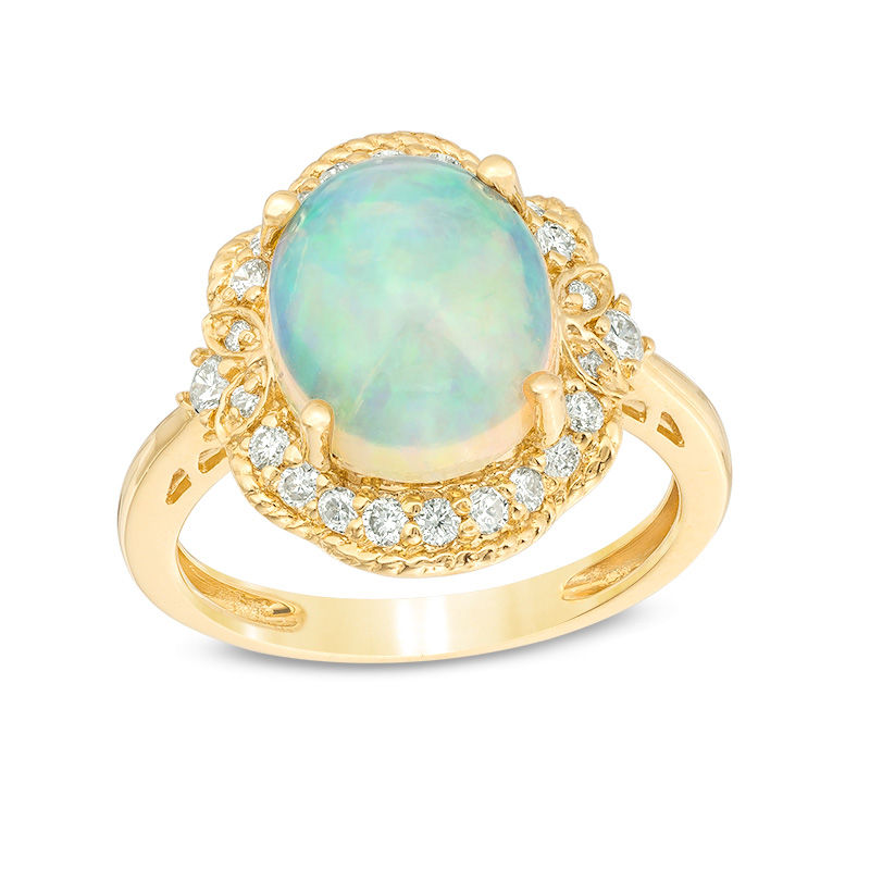 Oval Opal and 1/3 CT. T.W. Diamond Rope Frame with Leaf Accents Ring in ...
