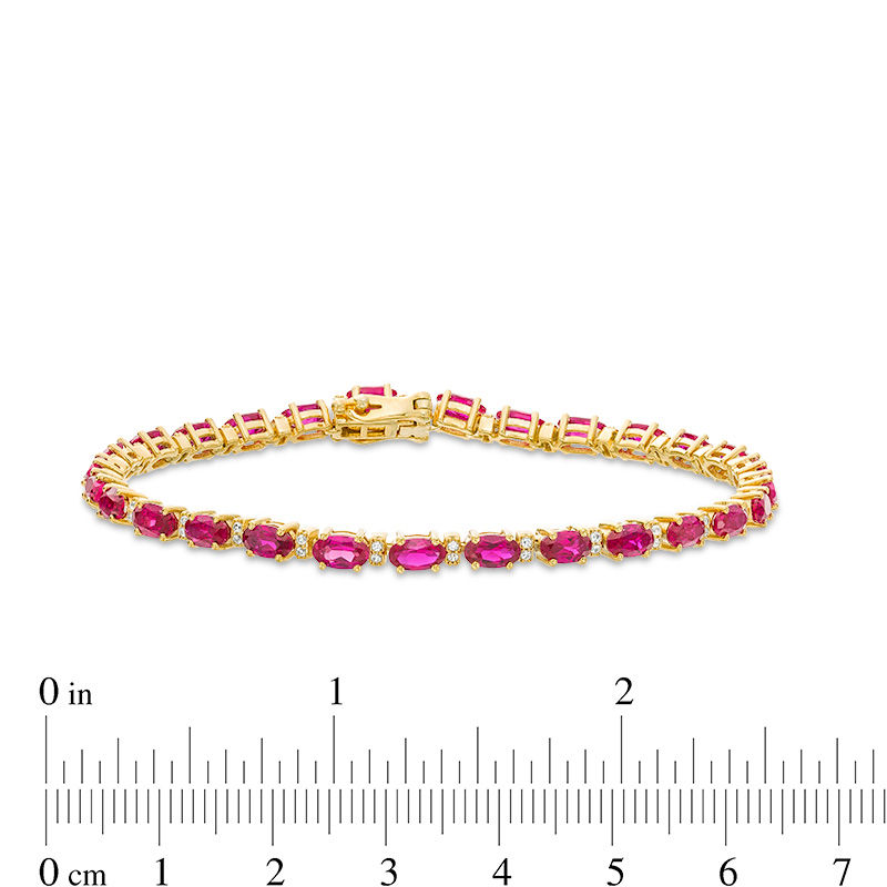 Main Image 4 of Oval Lab-Created Ruby and White Sapphire Bracelet in Sterling Silver with 14K Gold Plate