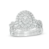 Thumbnail Image 1 of 3/4 CT. T.W. Oval Multi-Diamond Double Frame Twist Bridal Set in 10K White Gold
