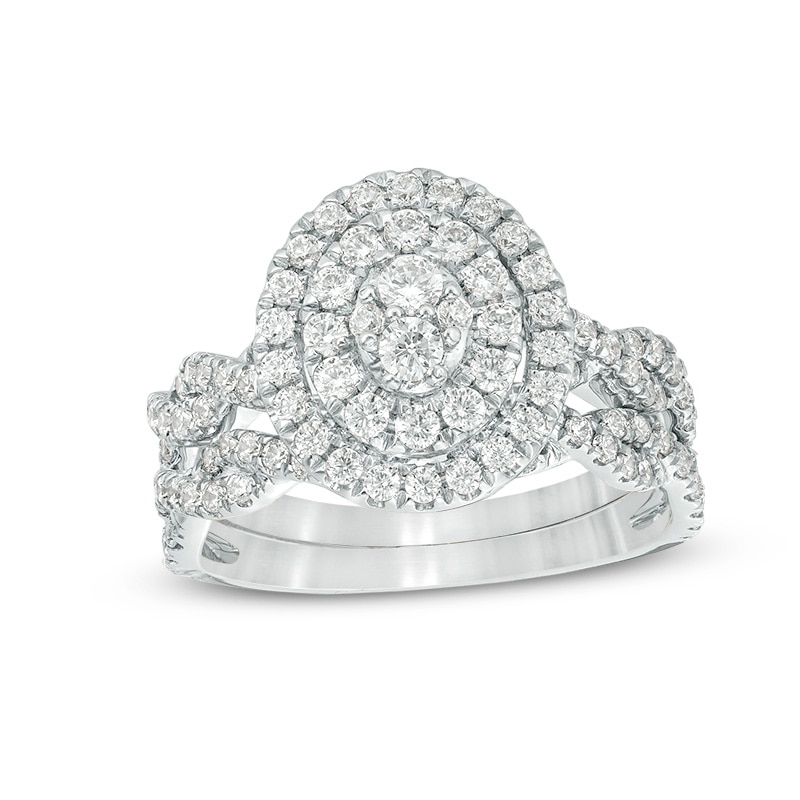 Main Image 1 of 3/4 CT. T.W. Oval Multi-Diamond Double Frame Twist Bridal Set in 10K White Gold