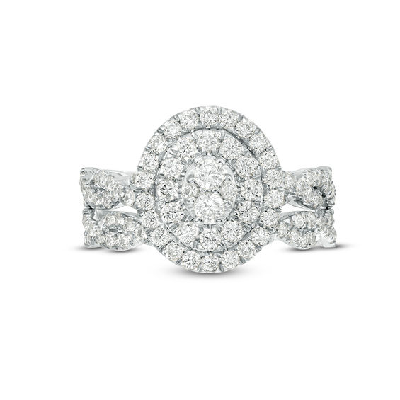 3/4 CT. T.w. Oval Multi-Diamond Double Frame Twist Bridal Set in 10K White Gold