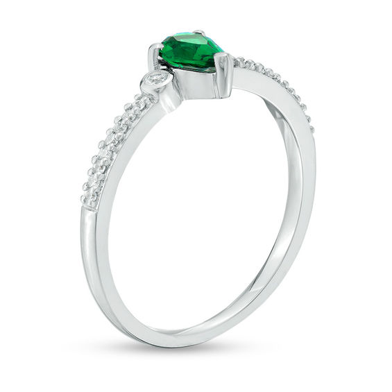 Pear-Shaped Lab-Created Emerald and 1/20 CT. T.w. Diamond Bezel-Set Side Accent Promise Ring in Sterling Silver