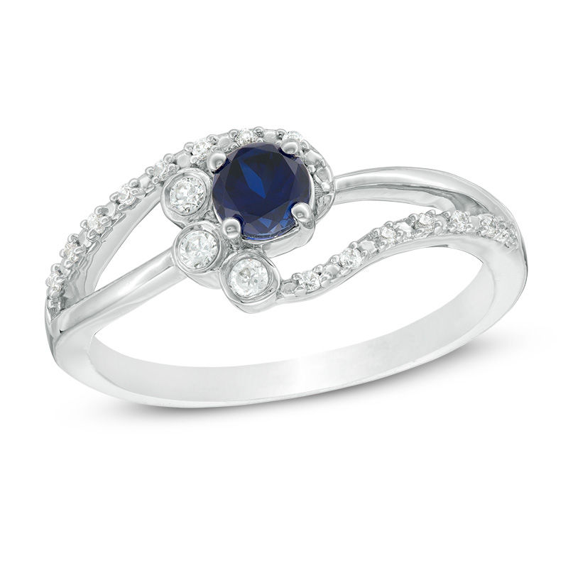 4.0mm Lab-Created Blue Sapphire and 1/15 CT. T.W. Diamond Bezel-Set Side Accent Bypass Promise Ring in Sterling Silver