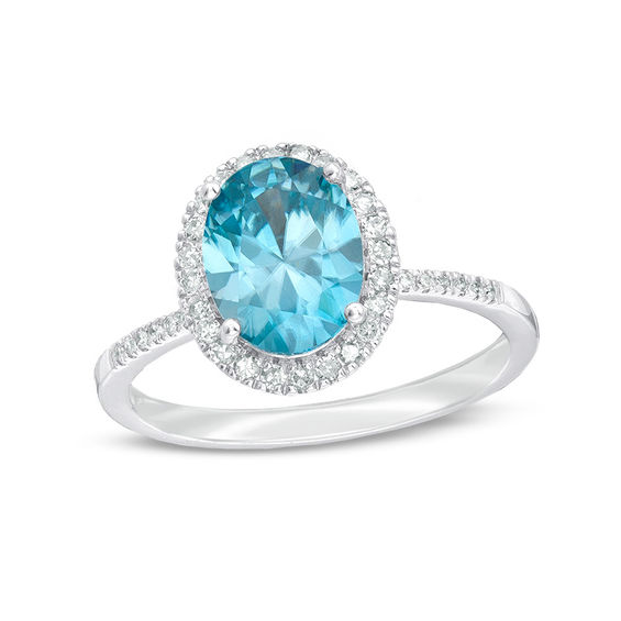 Oval Blue Zircon and 1/4 CT. T.w. Diamond Frame Engagement Ring in 14K White Gold