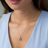 Thumbnail Image 1 of Certified Oval Emerald and 1/2 CT. T.W. Diamond Starburst Frame Pendant in 14K White Gold