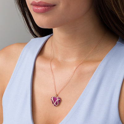 Jewel Zone US Simulated Ruby & Natural Diamond Looping Heart Pendant in 14K Gold Over Sterling Silver Jewel Zone US Simulated Ruby & Natural Diamond Looping Heart Pendant in 14K Gold Over Sterling Silver
