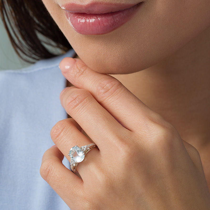 Main Image 2 of Oval Aquamarine and 1/8 CT. T.W. Diamond Tri-Sides Ring in 10K White Gold