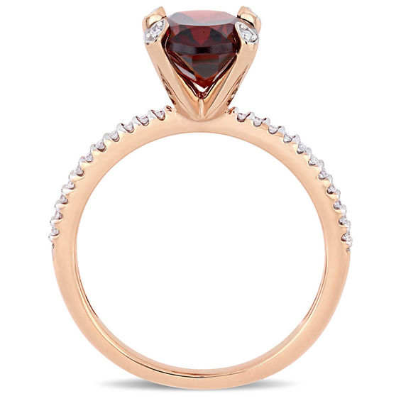 Oval Garnet and 1/10 CT. T.w. Diamond Engagement Ring 10K Rose Gold
