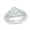 Thumbnail Image 0 of 1/2 CT. T.W. Oval Composite Diamond Leaf-Sides Bridal Set in Sterling Silver