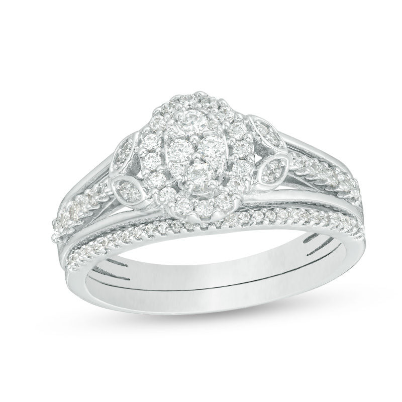 Main Image 1 of 1/2 CT. T.W. Oval Composite Diamond Leaf-Sides Bridal Set in Sterling Silver