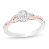 Thumbnail Image 1 of 1/8 CT. T.W. Diamond Frame Twist Shank Promise Ring in Sterling Silver and 10K Rose Gold