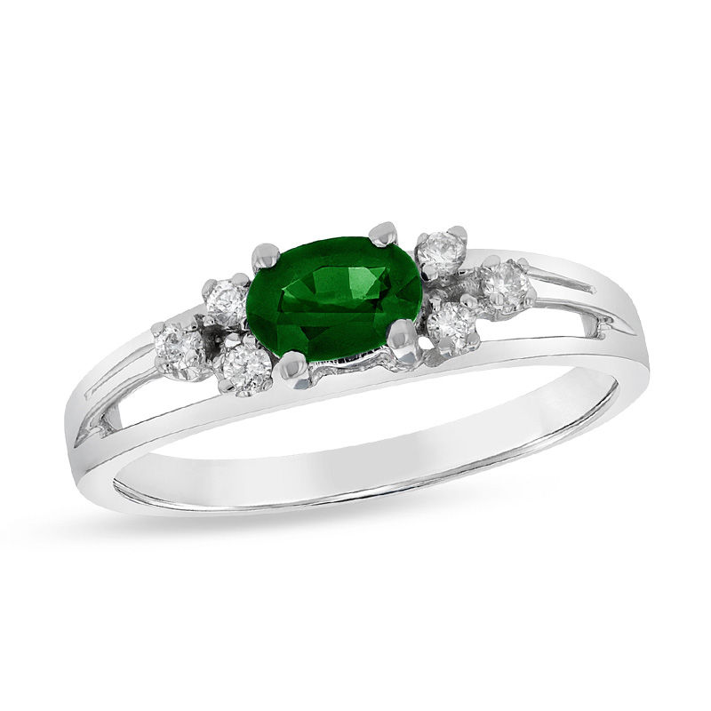 Sideways Oval Emerald and 1/10 CT. T.W. Diamond Tri-Sides Split Shank Ring in 14K White Gold