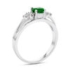 Thumbnail Image 1 of Sideways Oval Emerald and 1/10 CT. T.W. Diamond Tri-Sides Split Shank Ring in 14K White Gold