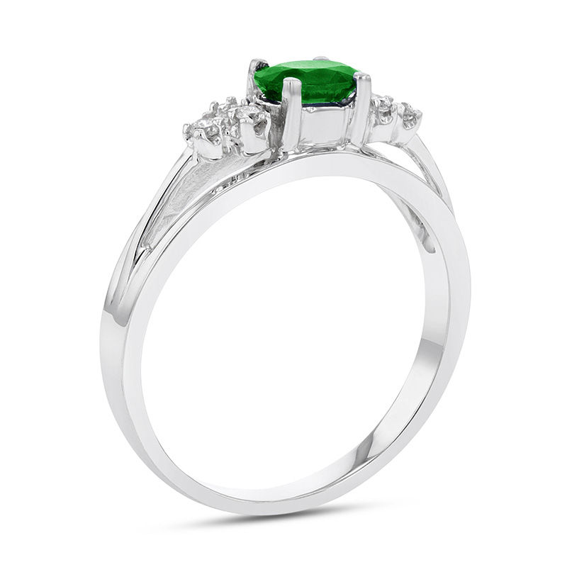 Sideways Oval Emerald and 1/10 CT. T.W. Diamond Tri-Sides Split Shank Ring in 14K White Gold