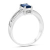 Thumbnail Image 1 of Emerald-Cut Blue Sapphire and 1/6 CT. T.W. Diamond Channel Engagement Ring in 14K White Gold