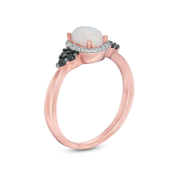 Oval Lab-Created Opal and 1/6 CT. T.w. Enhanced Black and White Diamond Frame Tri-Sides Ring in 10K Rose Gold