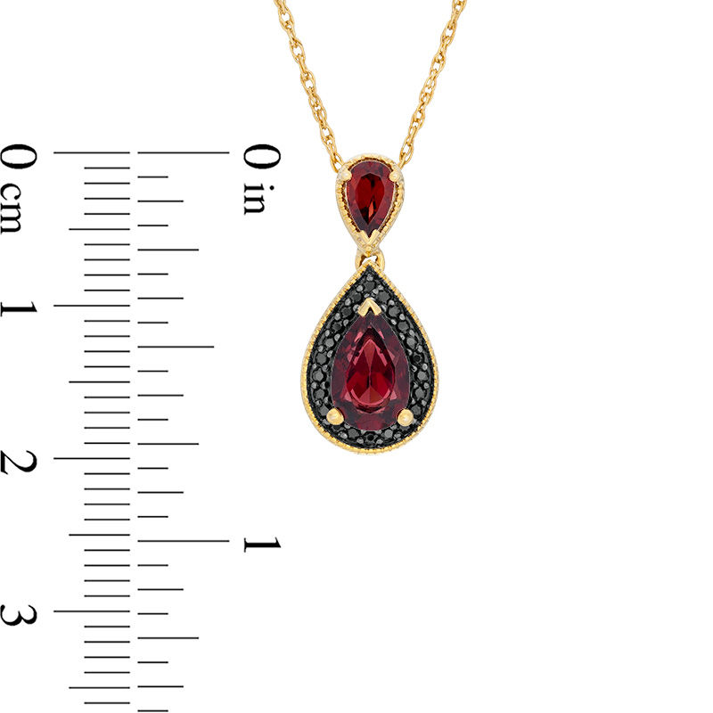 Pear-Shaped Garnet and 1/10 CT. T.W. Black Diamond Frame Vintage-Style Drop Pendant in 10K Gold