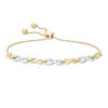 Thumbnail Image 0 of Large and Small Alternating Infinity Link Bolo Bracelet in 10K Two-Tone Gold - 9.5"