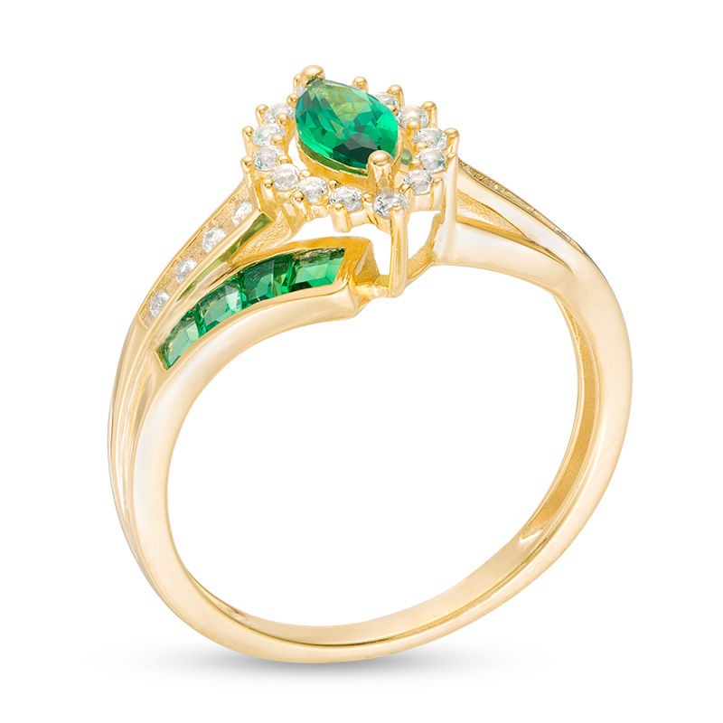 Marquise Emerald and 1/6 CT. T.W. Diamond Double Row Bypass Ring in 10K Gold