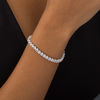 Thumbnail Image 1 of White Lab-Created Sapphire Three-Prong Tennis Bracelet in Sterling Silver - 7.25"