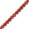 Thumbnail Image 1 of Garnet Tennis Bracelet in Sterling Silver with 14K Gold Plate - 7.25"