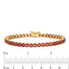 Thumbnail Image 4 of Garnet Tennis Bracelet in Sterling Silver with 14K Gold Plate - 7.25"