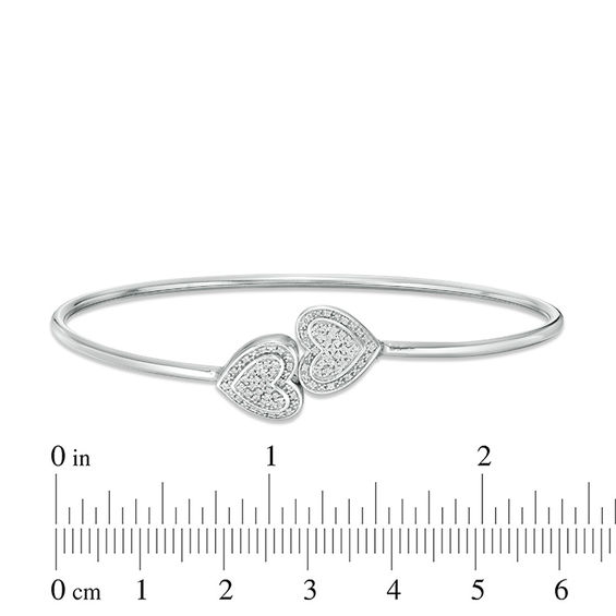 1/10 CT. T.w. Diamond Double Sideways Heart Flex Bangle in Sterling Silver