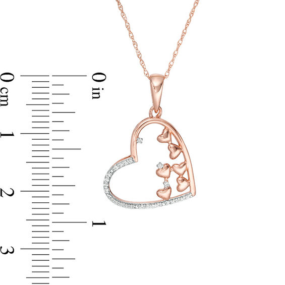 1/10 CT. T.w. Scattered Diamond Tilted Heart Outline Pendant in 10K Rose Gold