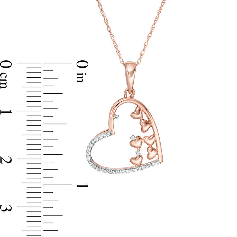 Main Image 2 of 1/10 CT. T.W. Scattered Diamond Tilted Heart Outline Pendant in 10K Rose Gold