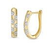 Thumbnail Image 1 of Diamond Accent Polka Dot Oval Hoop Earrings in 10K Gold