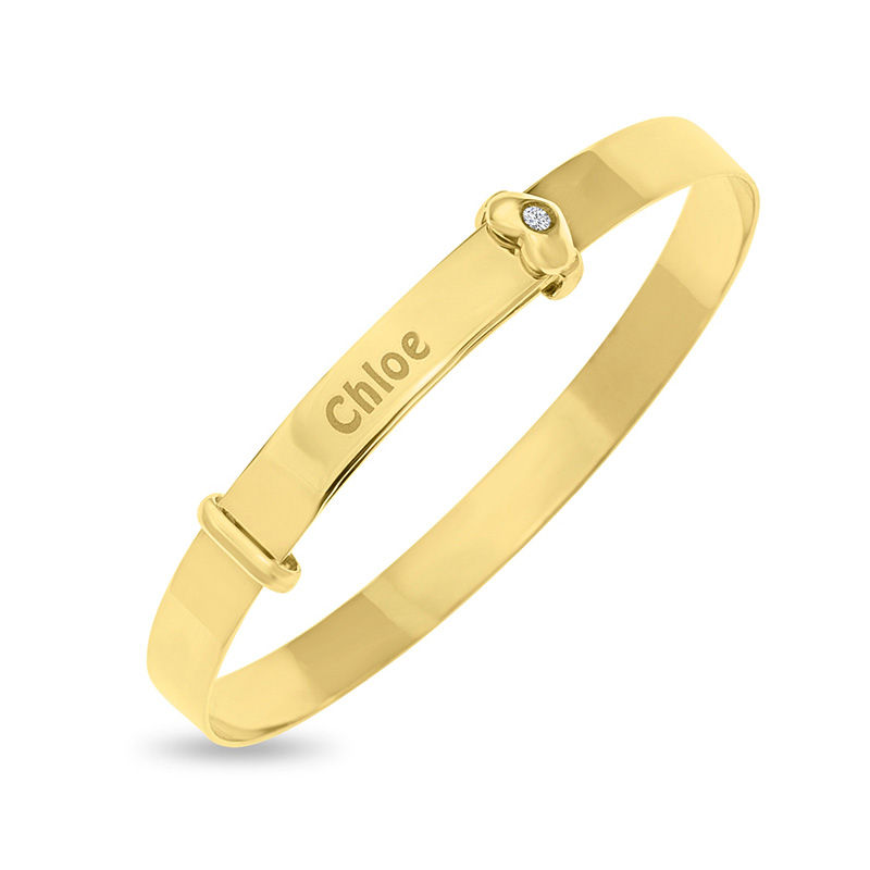 1/2 CT. T.W. Baguette and Round Diamond Bangle in 10K Gold | Zales